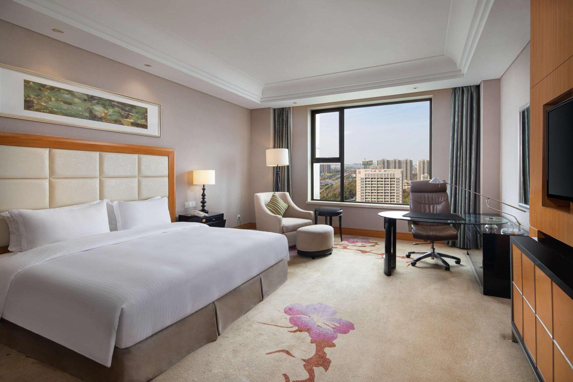 Wyndham Xinyang Downtown Hotel ภายนอก รูปภาพ